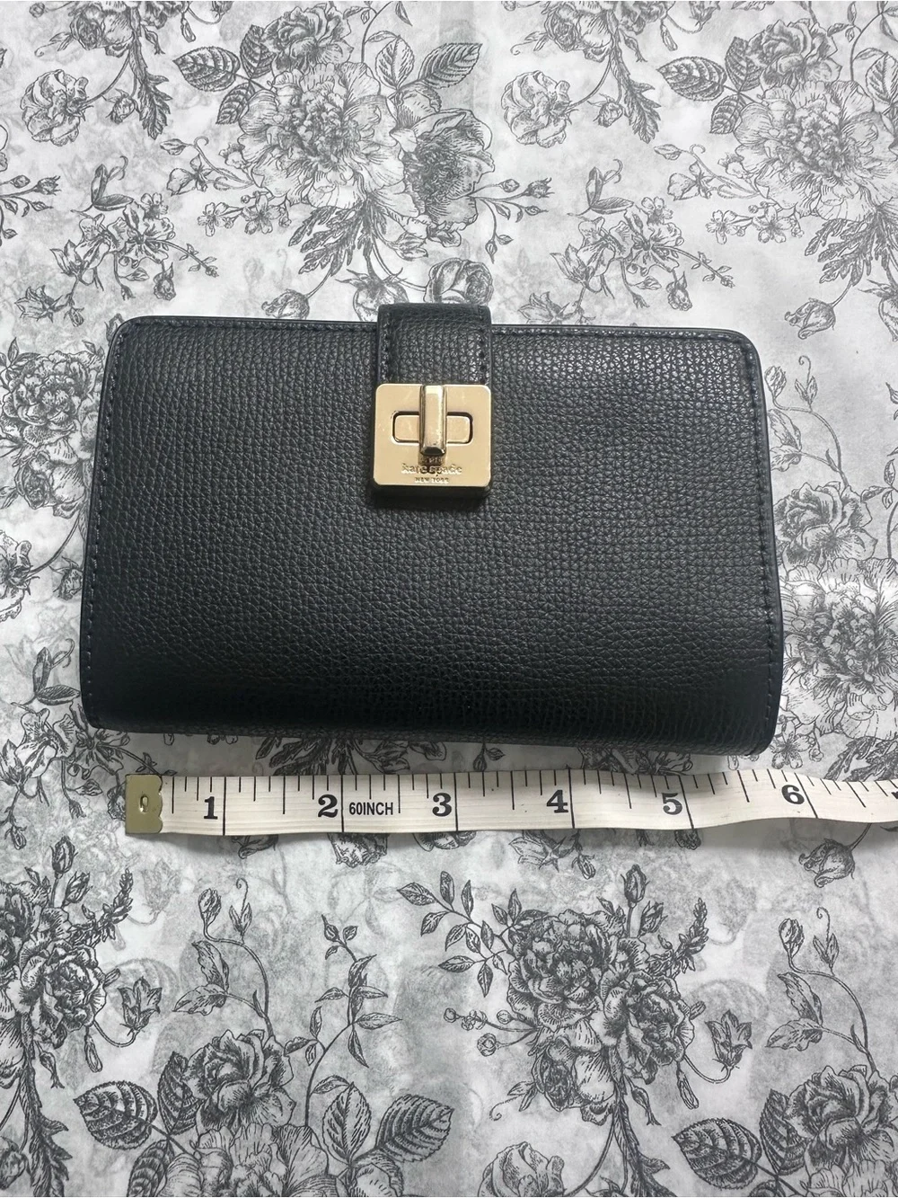 kate spade Black Pebbled Leather Continental Wallet with Gold Logo